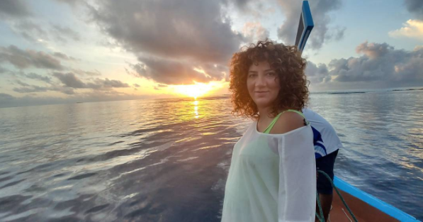 Aline- enjoying a sunset trip at Constance Halaveli Maldives